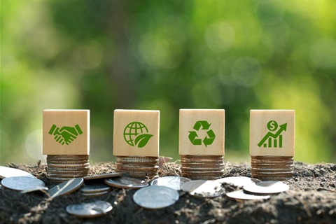 4 woooden blocks with the recycling icons on them
